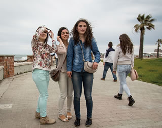 Women stroll the waterfront in Durrës, Albania, western terminus of the Via Egnatia and today the country's leading port.