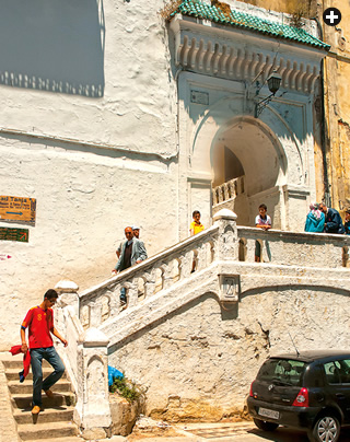  Winding up from the narrow Rue d’Amerique in Tangier’s madinah (old walled city), residents climb the stairs to TALIM’s arched doorway.
