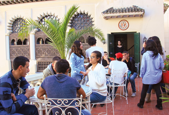 Moroccan students on a field trip relax on the terrace of the Tangier American Legation Institute for Moroccan Studies, or talim. A gift to the us in 1821 from Sultan Mulay Suleiman, the “embassy without an ambassador” —the American Legation, Tangier—became a gathering place for diplomats, business leaders and writers. In the late 1990s, it refocused its mission on education.